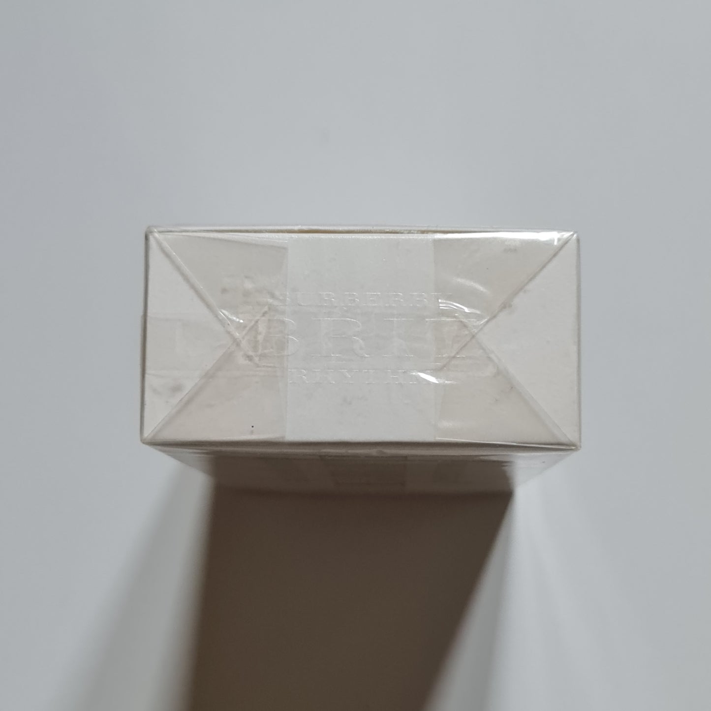 Burberry Brit Rhythm For Her Eau De Toilette 90ml. Top of box photo of perfume box.