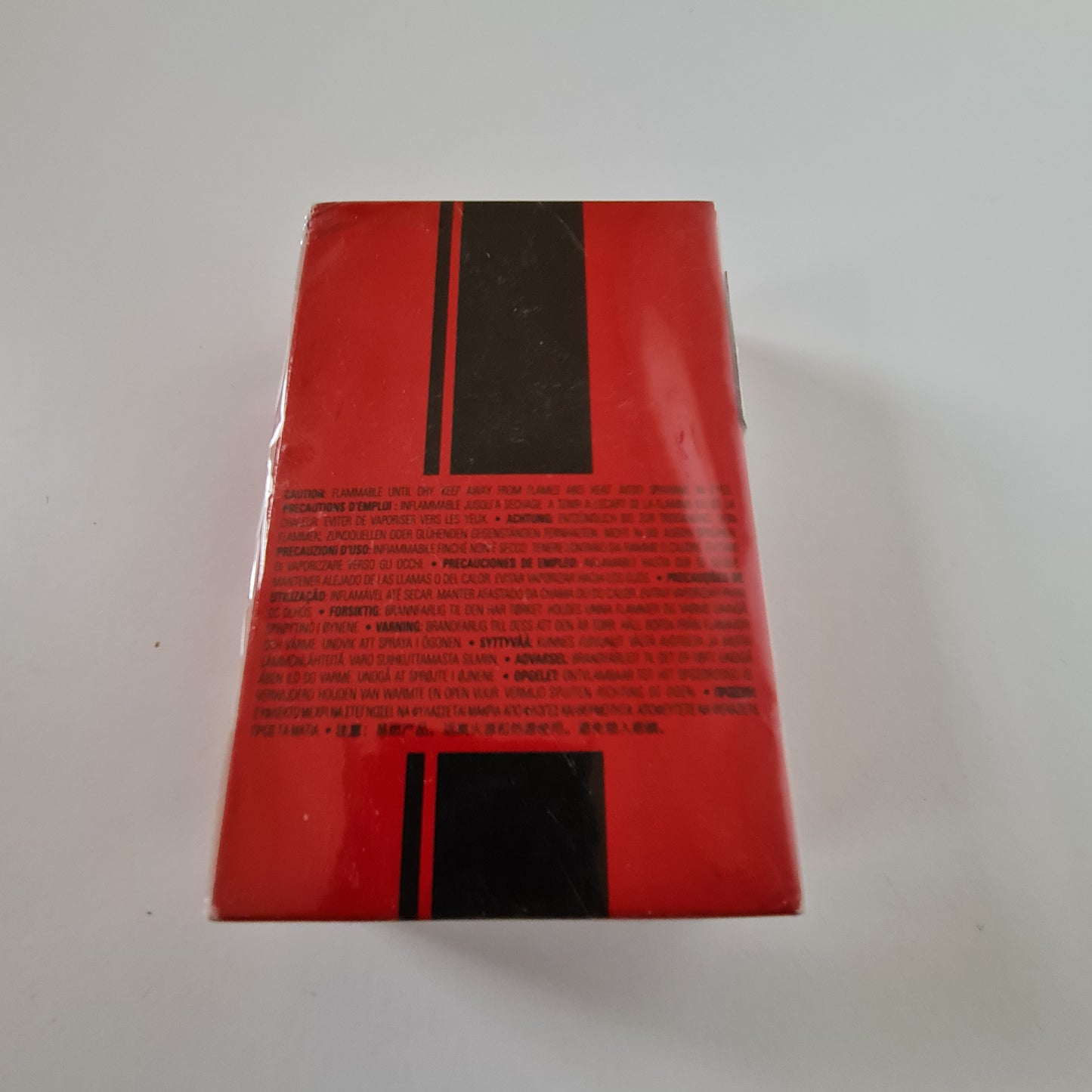 Photo showing rear of perfume box.