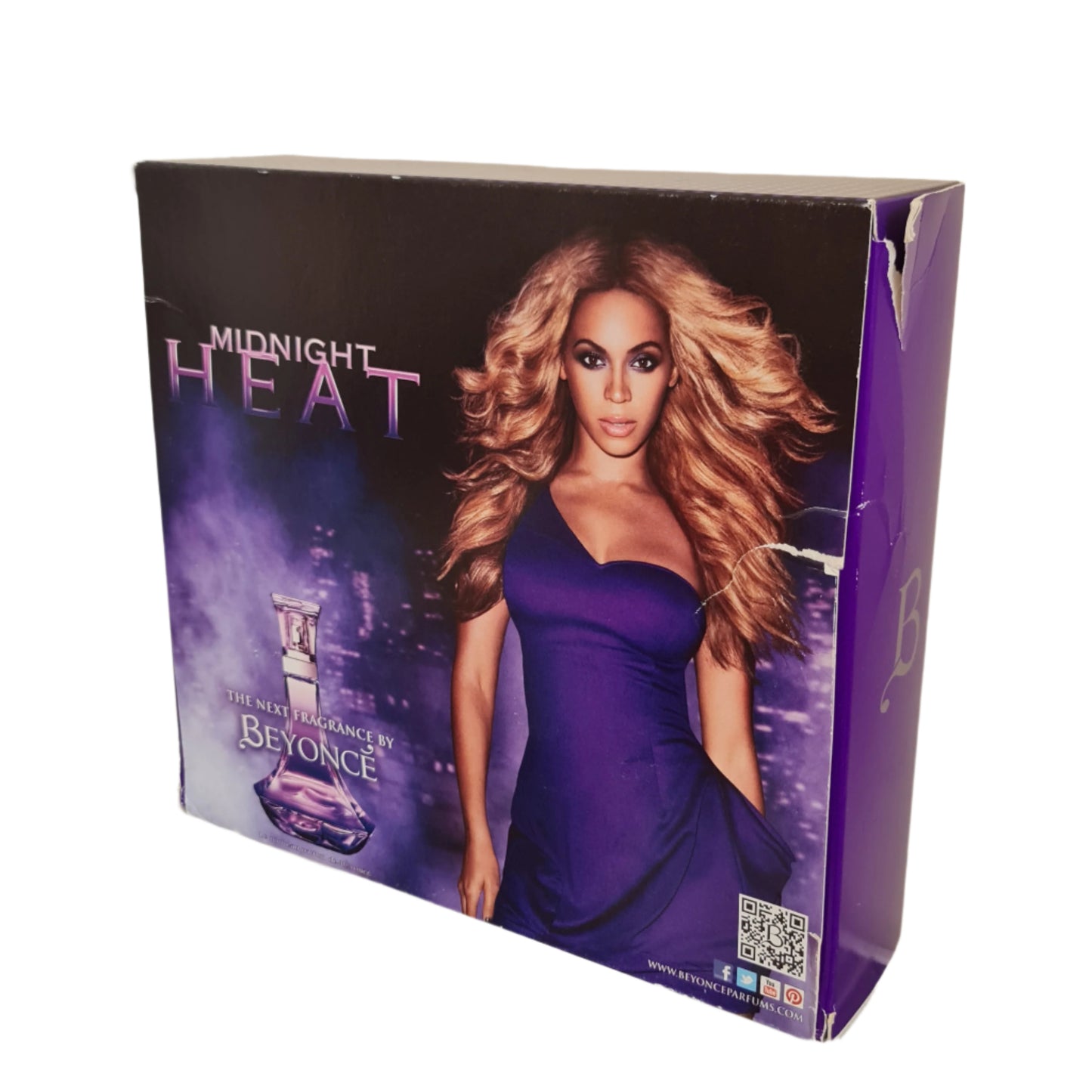 Side of gift box showing tear.