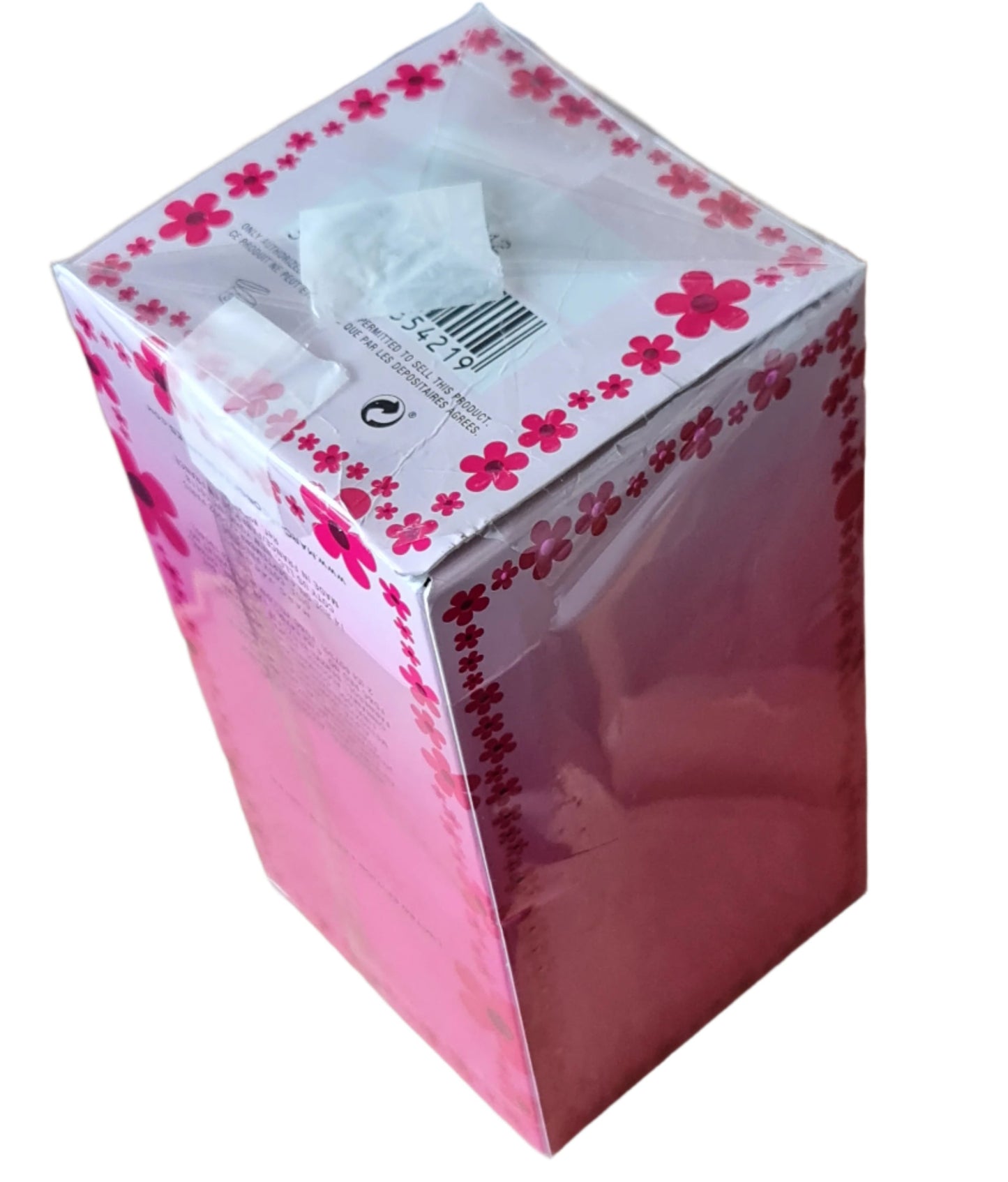 Photo showing imperfect cellophane on base.