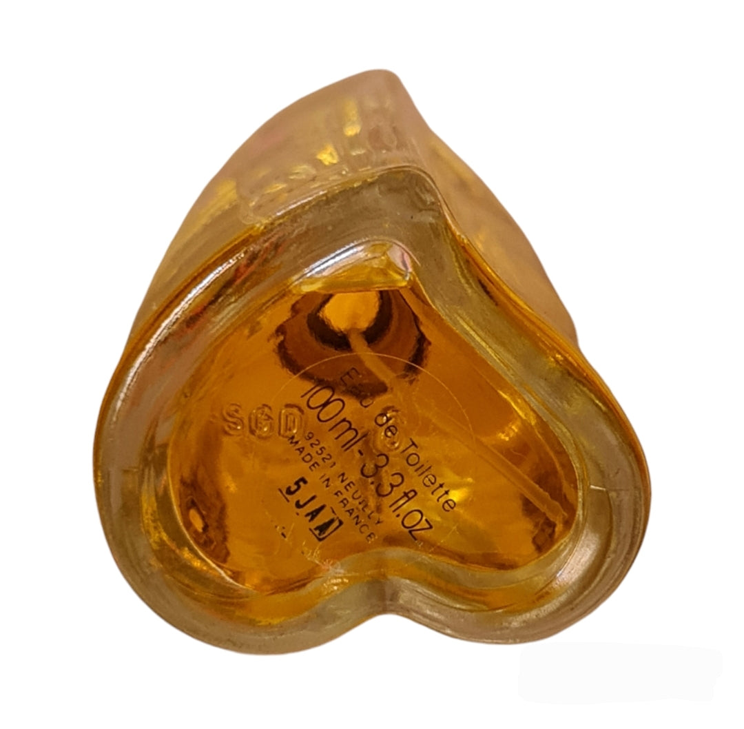 Photo of base of perfume bottle.