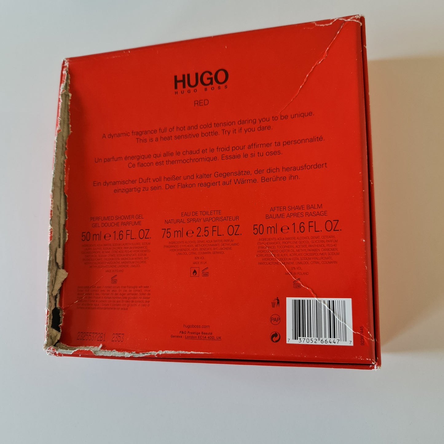 Hugo Boss Red Eau de Toilette 75ml gift set. Photo showing damaged back of box at angle. Perfume, fragrance, cologne and scent.