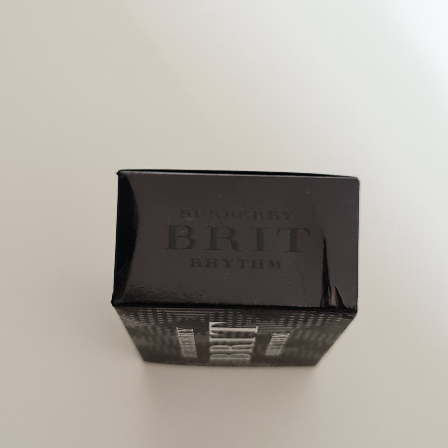 Burberry Brit Rhythm Eau de Toilette 50ml.  Bird's eye view photo of box, scent, cologne, perfume and fragrance.