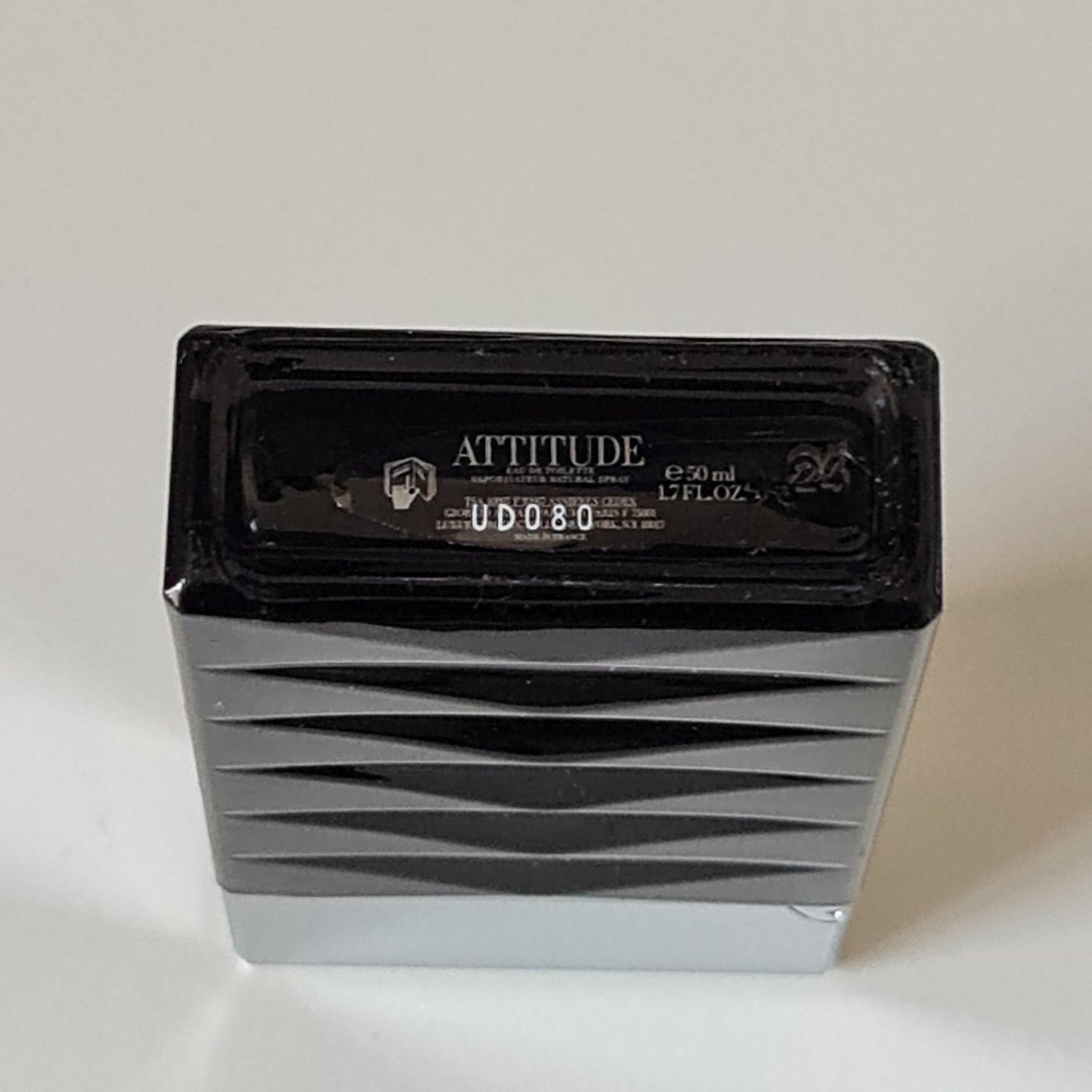 Giorgio Armani Attitude Eau De Toilette 50ml. Photo showing base of bottle, perfume.