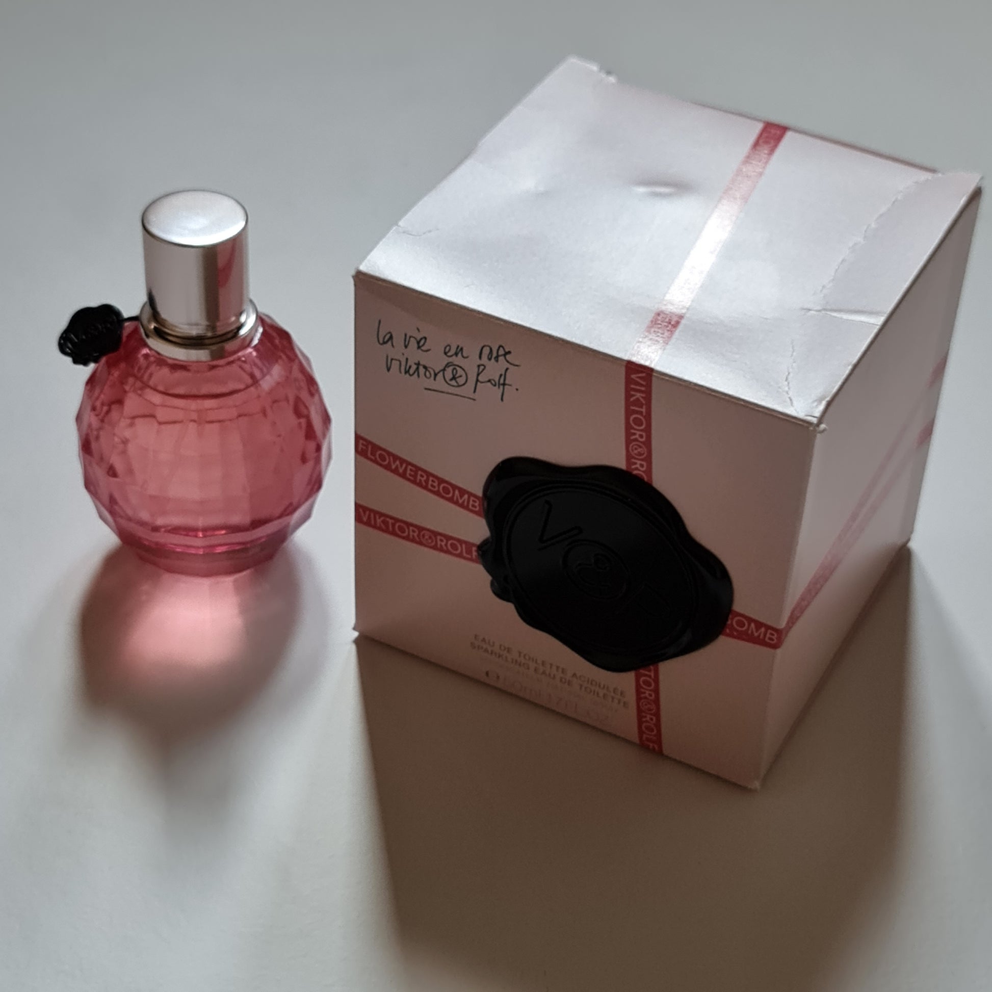 Viktor & Rolf Flowerbomb La Vie En Rose Eau De Toilette 50ml. Front photo of bottle and box three, perfume, fragrance, cologne and scent.