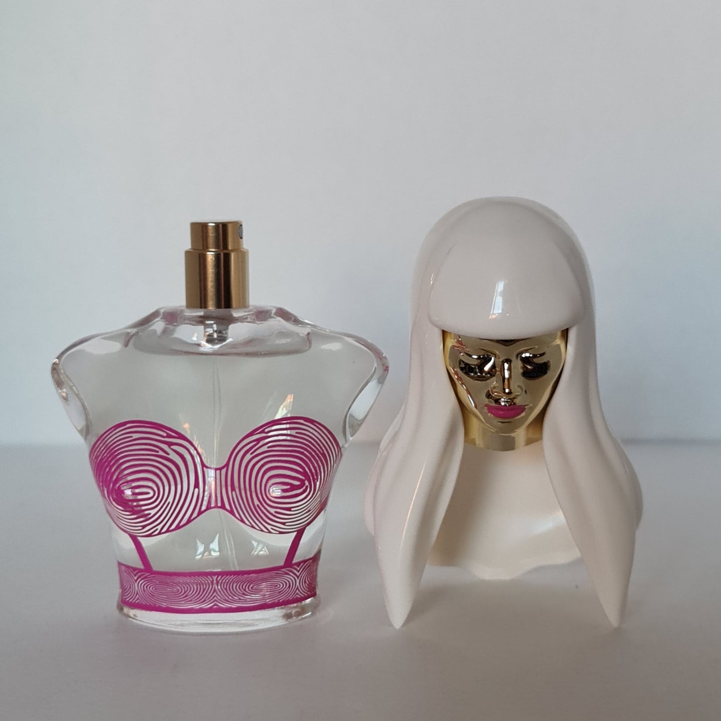 Perfume bottle without cap on.