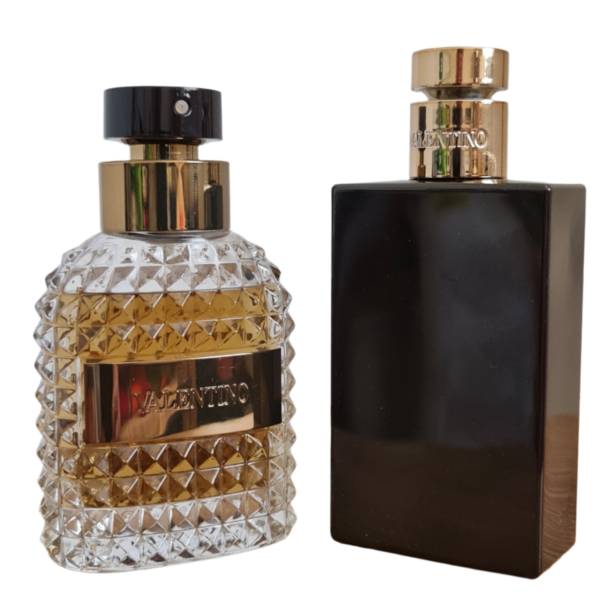 Perfume and shower gel bottle at a angle.