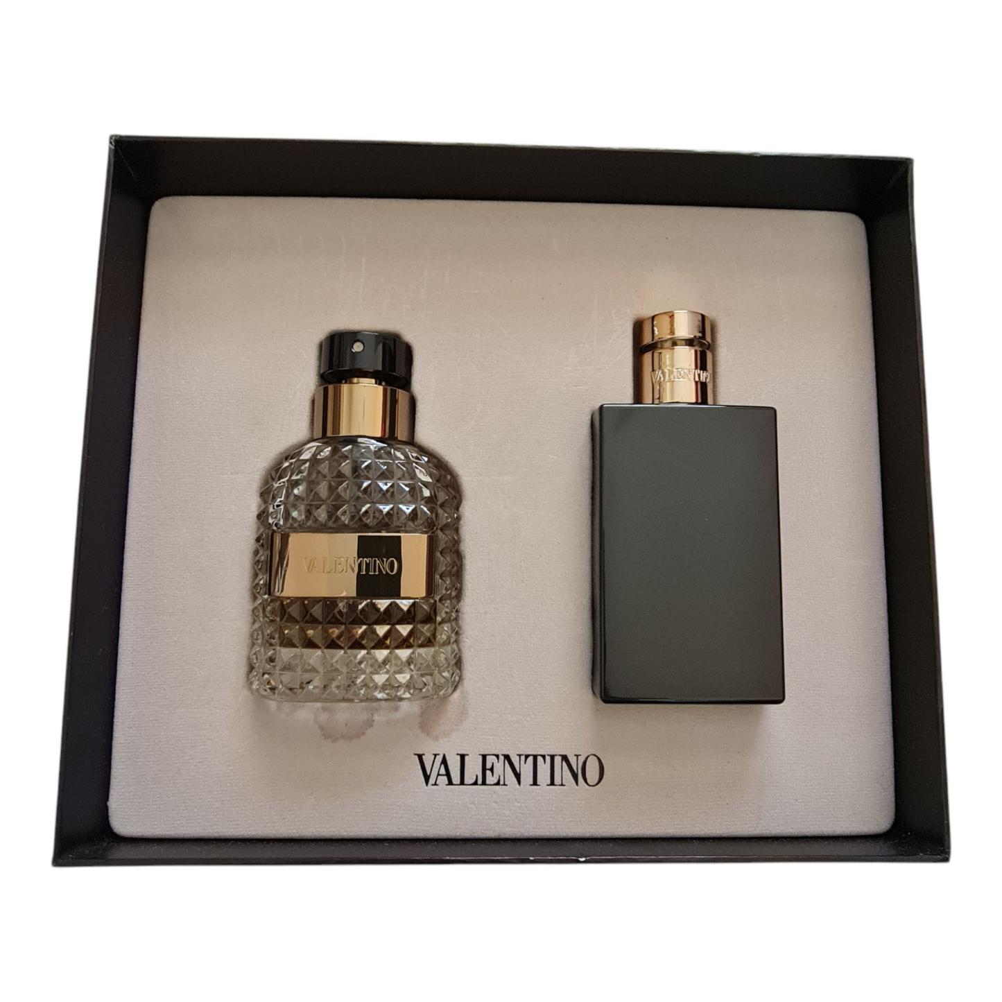 Internal with perfume and shower gel bottle.