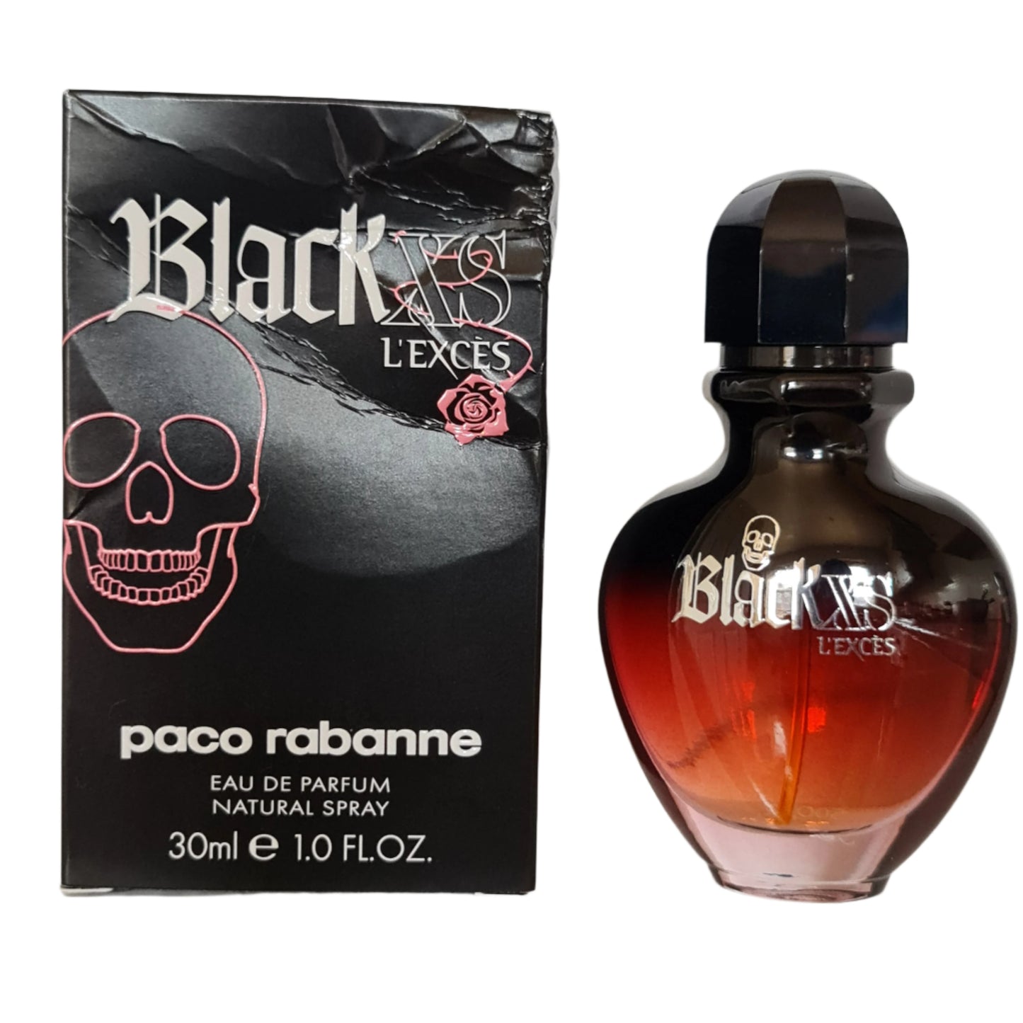 Perfume box and bottle side by side photo.