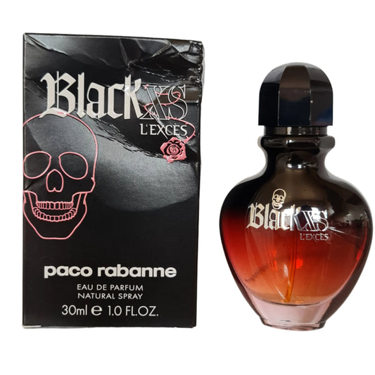 Perfume box and bottle side by side photo.