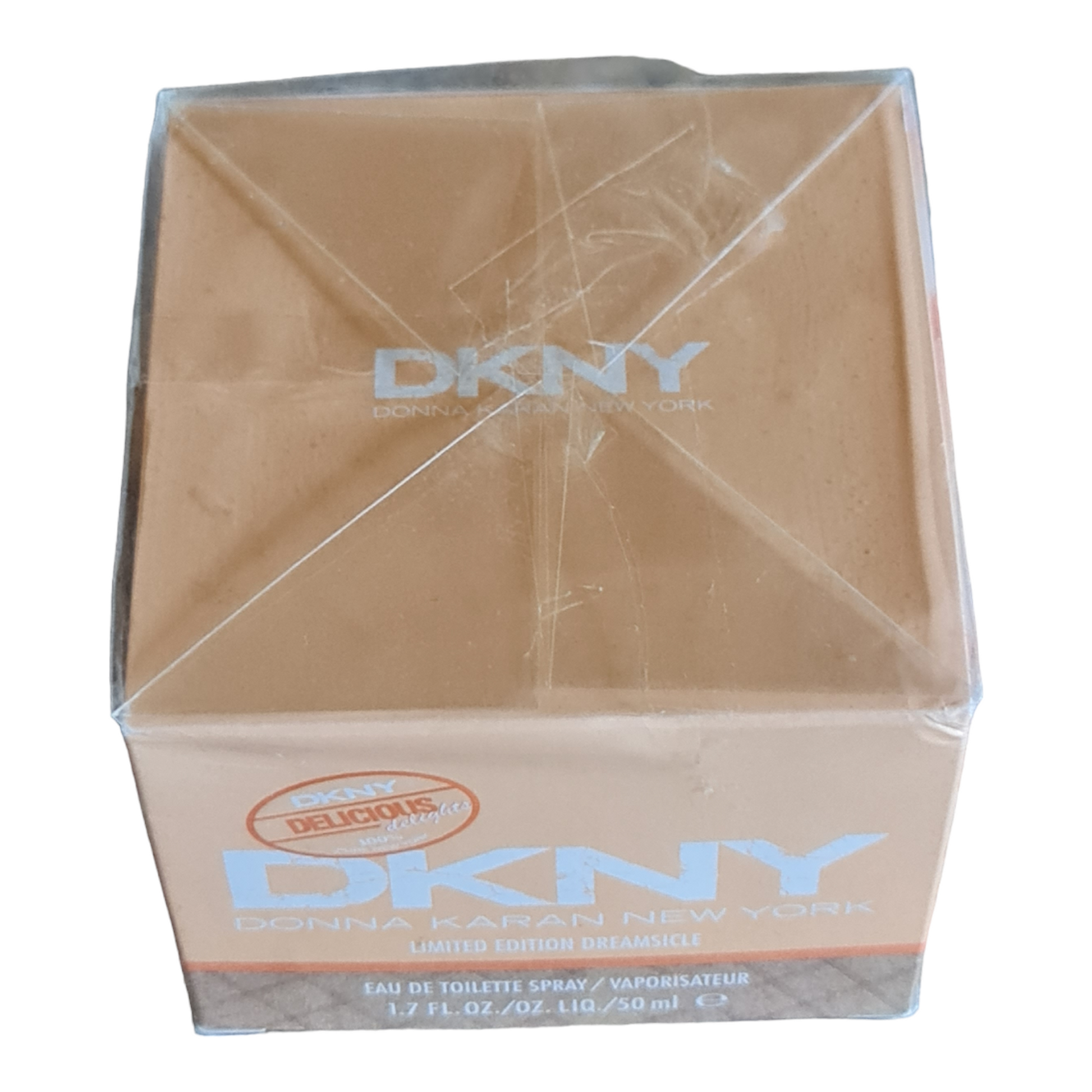 DKNY Delicious Delights Dreamsicle Eau de Toilette 50ml. Top angled photo two showing tear in cellophane.