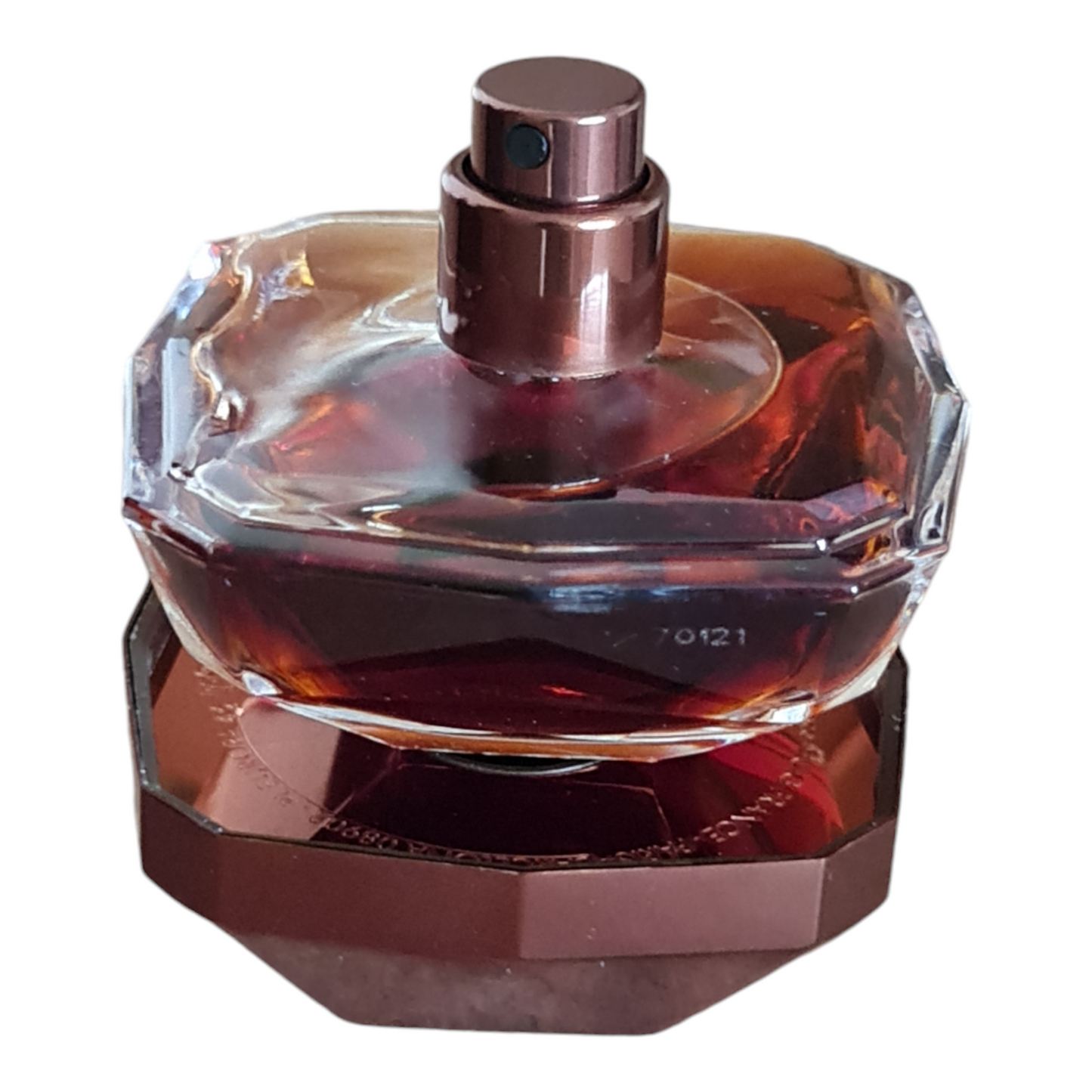 Pefume bottle and lid.