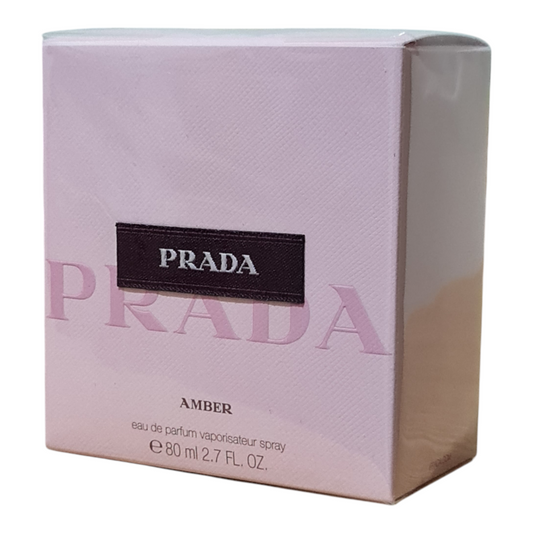 Prada Amber Pour Femme Eau de Parfum 80ml. Photo showing perfume box at a angle.