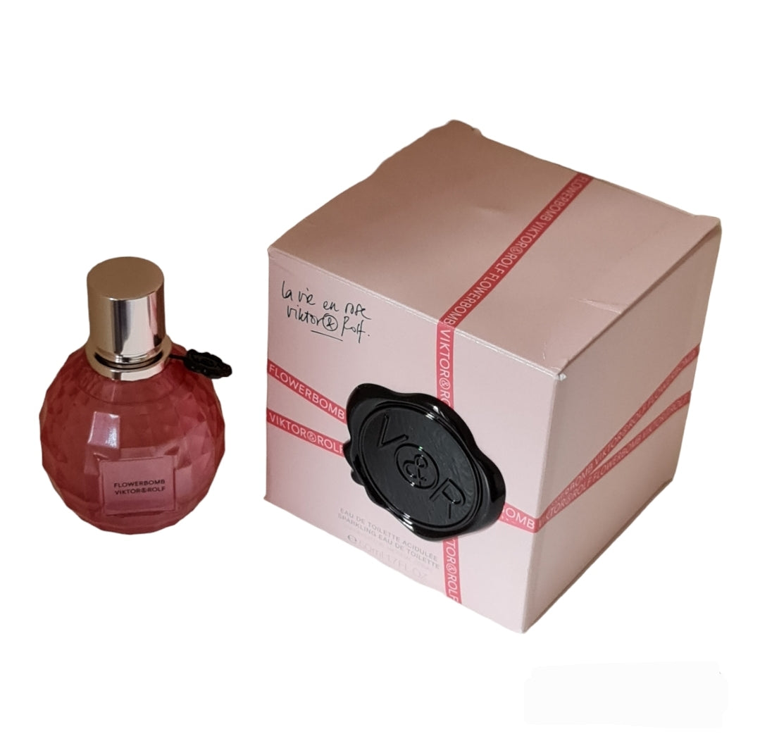 Viktor & Rolf Flowerbomb La Vie En Rose Eau De Toilette 50ml. Front bird's eye view of photo showing bottle and box, perfume, fragrance, cologne and scent.