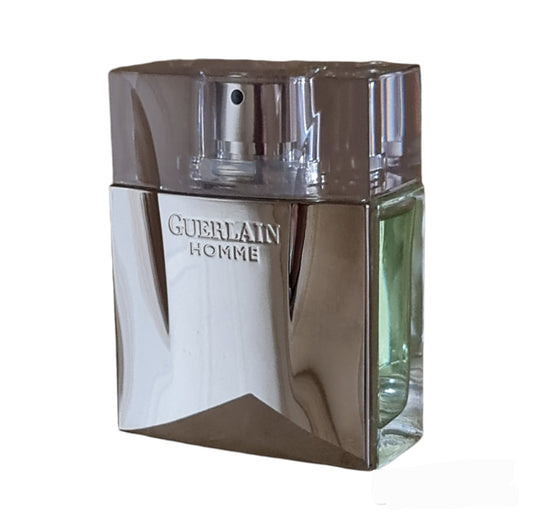 Guerlain Homme Eau de Toilette 80ml. Front of perfume bottle on a angle.