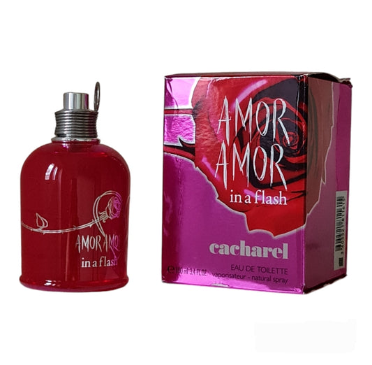 Cacharel Amor Amor In A Flash Eau de Toilette 100ml. Front photo showing perfume box and bottle.