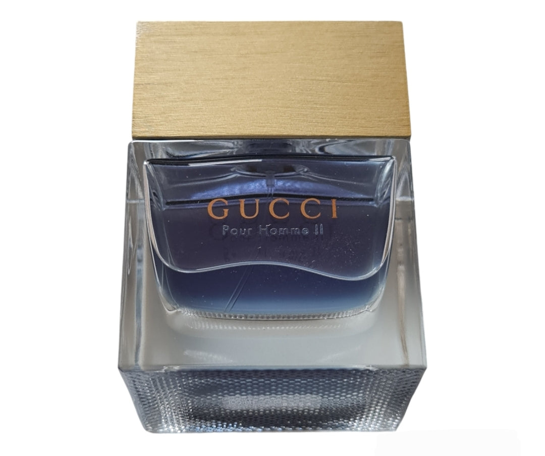 Gucci Pour Homme II (2) Eau De Toilette 100ml. Photo of perfume bottle lying down.