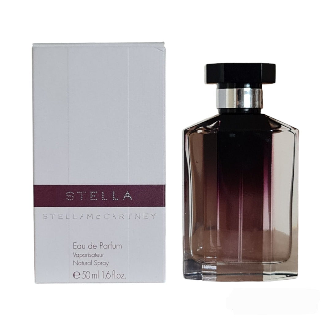 Stella McCartney Stella Eau De Parfum 50ml. 2003 Silver Collar version. Photo of perfume box and bottle side by side.