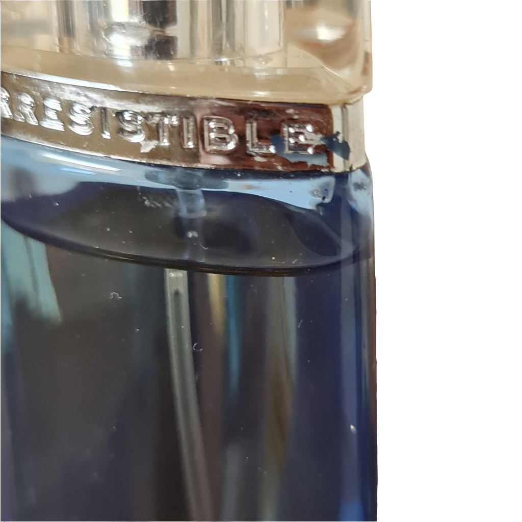 Photo showing silver on bottle coming off.