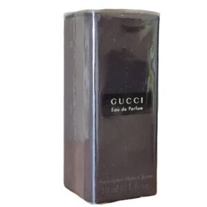 gucci eau de parfum 30ml. Front angled photo of dark brown box with the Gucci branding.