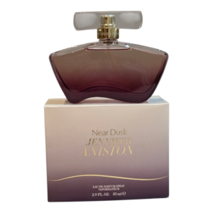 jennifer aniston near dusk eau de parfum 85ml. Bottle on top of box.