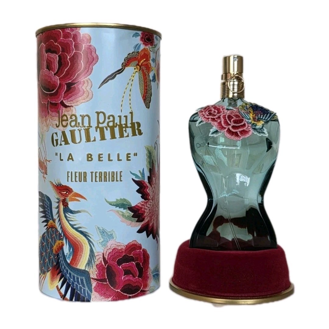 jean paul la belle fleur terrible eau de parfum 100ml jean paul la belle fleur terrible eau de parfum 100ml. Tin can and bottle side by side photo.