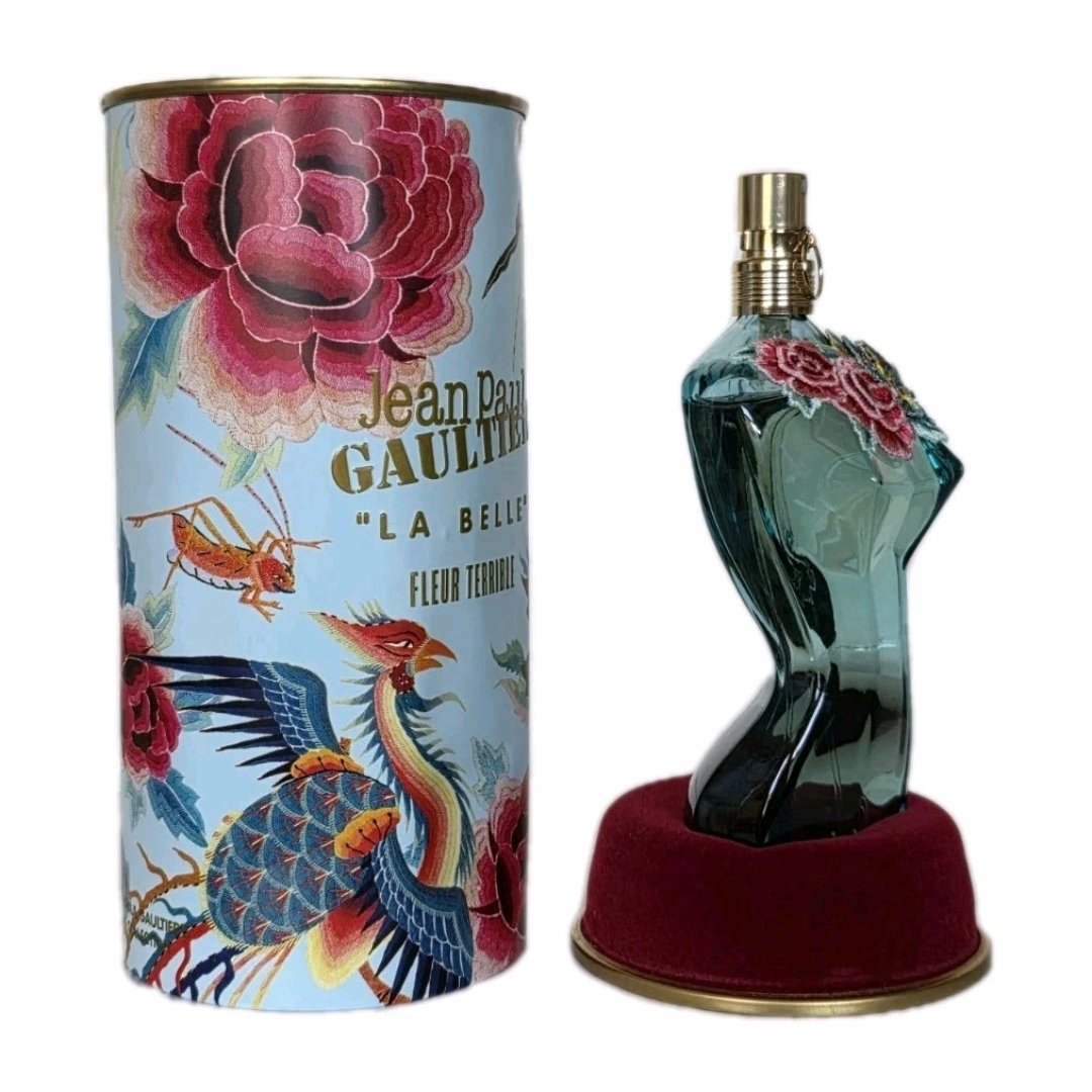 jean paul la belle fleur terrible eau de parfum 100ml jean paul la belle fleur terrible eau de parfum 100ml. Bottle and tin can at a angle.